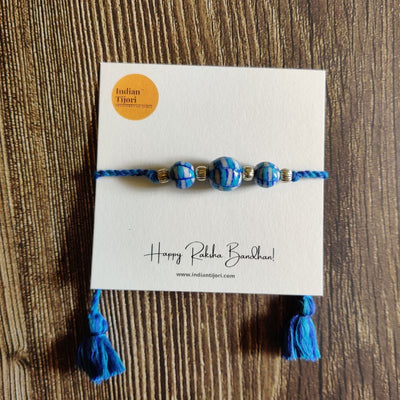 Light Blue Patwa & Blue Pottery Rakhi