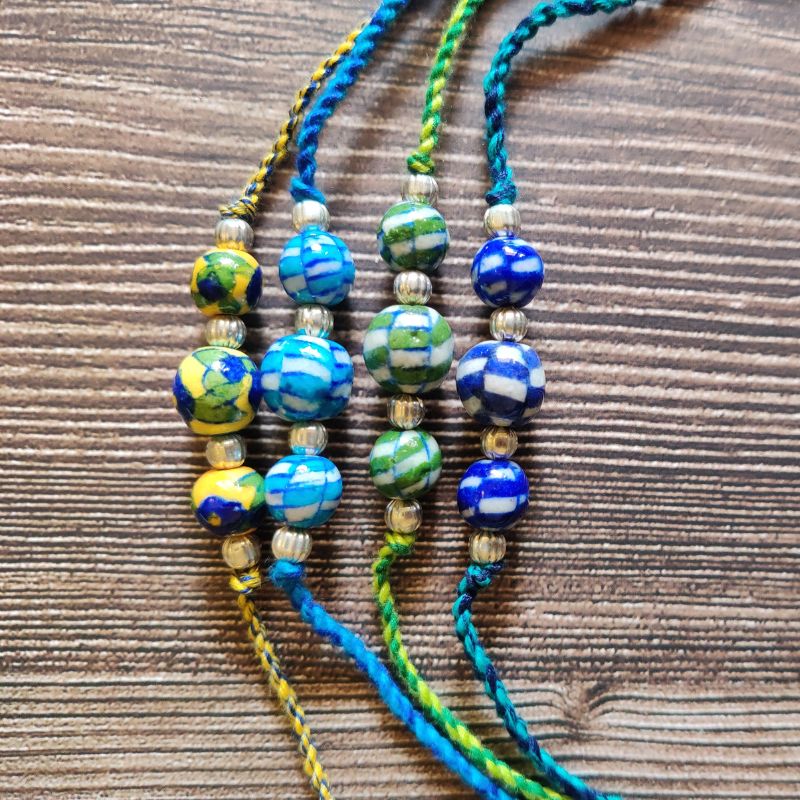 Green Patwa & Blue Pottery Rakhi