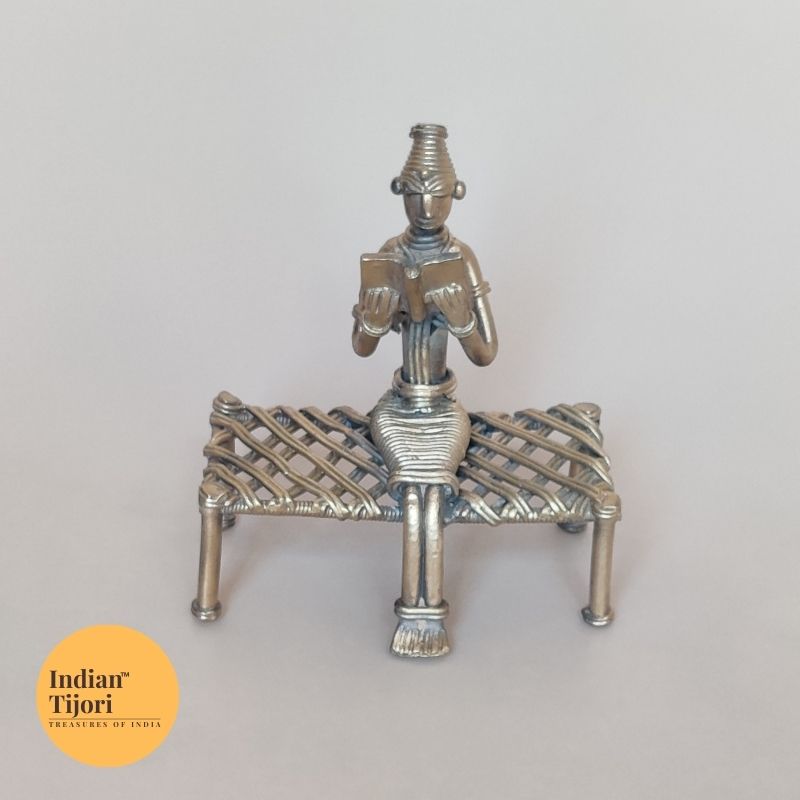 Dhokra Tribal Sitting on Bench