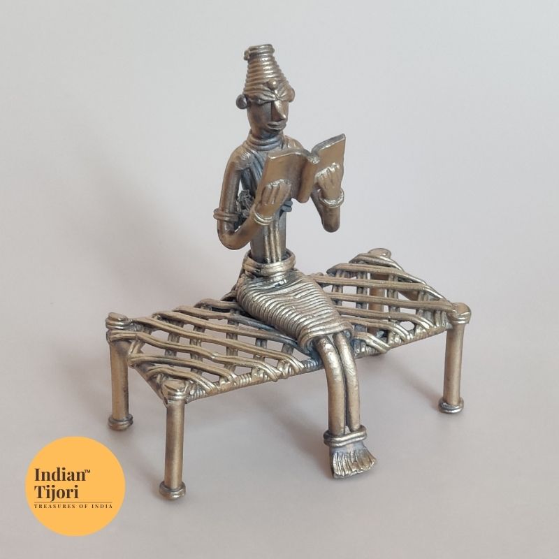 Dhokra Tribal Sitting on Bench